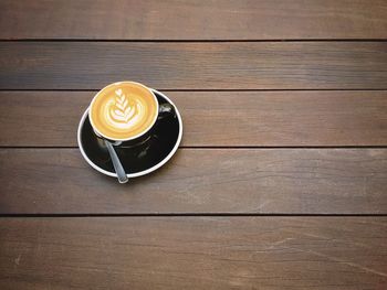 Close-up of coffee cup on table