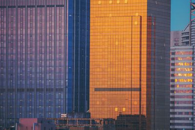 Exterior of modern buildings at sunset