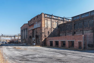 Old, rusted buildings located in porcelain factory in katowice, silesia, poland.