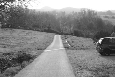 Country road passing through landscape