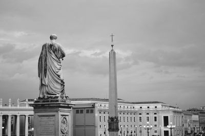 Low angle view of building against cloudy sky