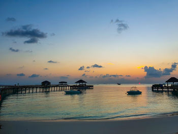 Scenic view of sea against sky at sunset
