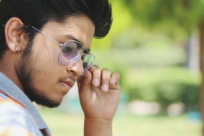 Close-up of man wearing eyeglasses