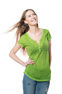 Portrait of a smiling young woman over white background