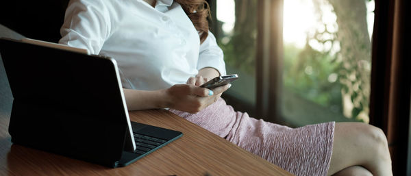 Low angle view of mobile phone on table