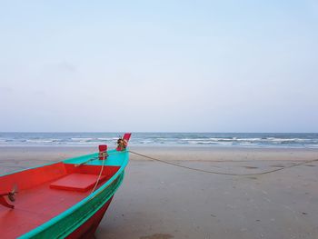 Scenic view of beach against clear sky