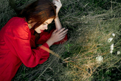 Side view of girl on field