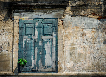 Closed window of old building