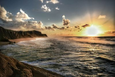 Scenic view of sea at sunset