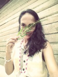 Portrait of beautiful woman drinking glass