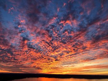 Low angle view of dramatic sky during sunset