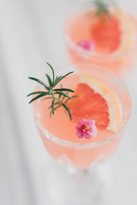 Close-up of orange fruit on glass table