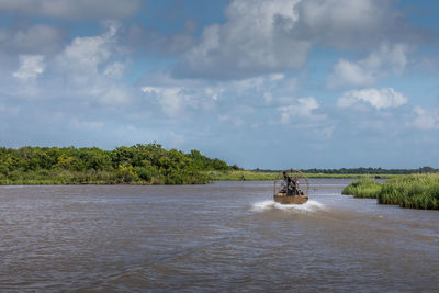 Scenic view of river against sky