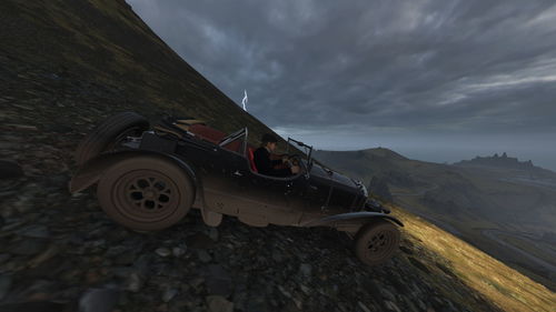 View of car on road against cloudy sky