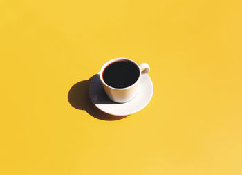 High angle view of coffee cup on table