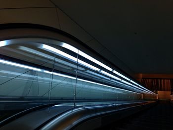 Blurred motion of illuminated railroad station