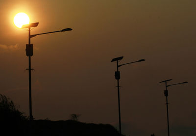 Low angle view of street light at night