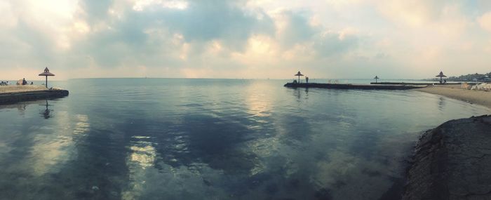 Panoramic view of sea against sky during sunset