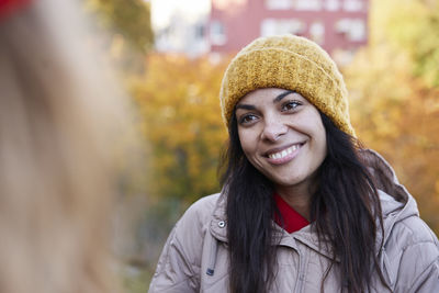 Happy woman in autumn scenery