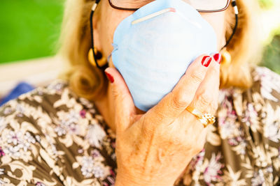 Close-up of woman holding hands