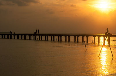 Scenic view of sea against dramatic sky