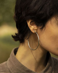 Close-up of young woman looking away