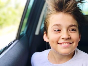 Close-up portrait of smiling boy