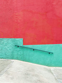 High angle view of a geometric green and red wall 