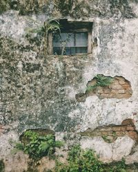 Close-up of old abandoned house