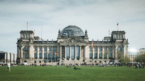 Group of people in front of building