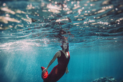 Man swimming in sea