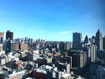 Cityscape against blue sky