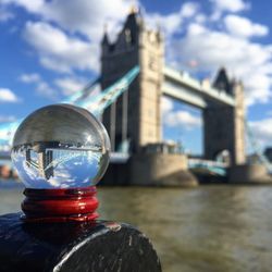 Reflection of tower bridge on crystal ball