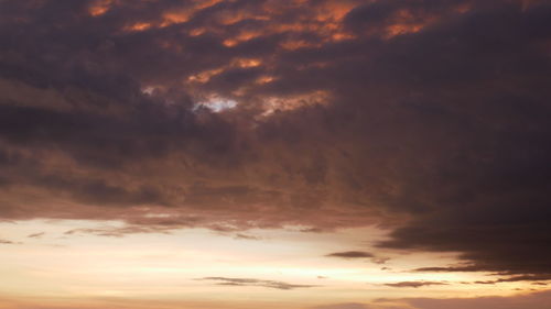 Low angle view of dramatic sky during sunset