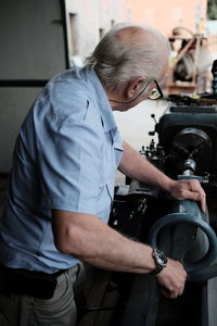 Midsection of man working