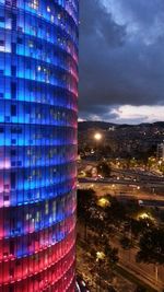 Illuminated cityscape against clear sky