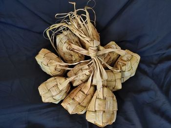 High angle view of bread tied on wood