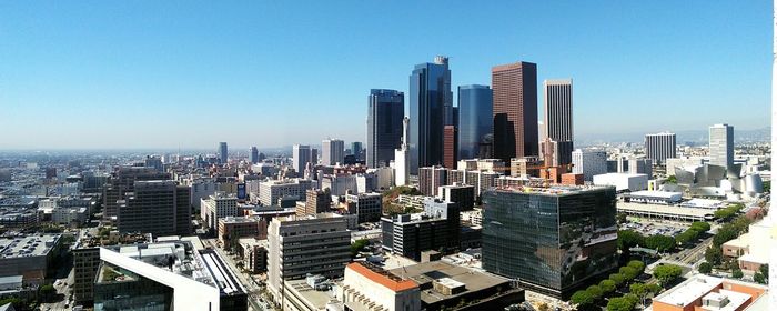 View of cityscape against clear sky