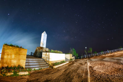 Low angle view of historical building against sky at night