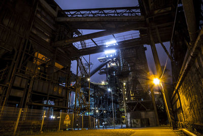 Illuminated factory at night