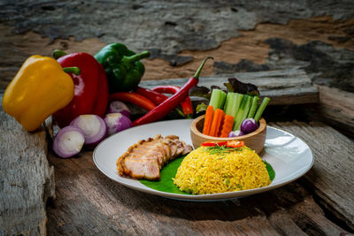 Close-up of chopped vegetables in plate on table