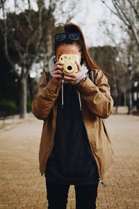 Man photographing with camera