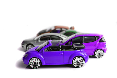 Close-up of toy car against white background