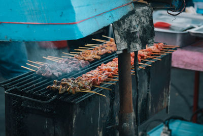 Close-up of meat on barbecue grill