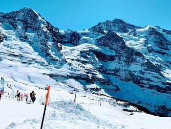 Scenic view of snowcapped mountain against sky