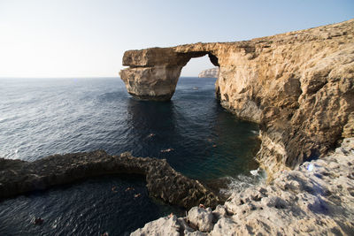 Scenic view of azure window on sea against sky