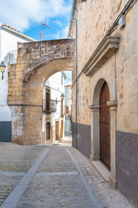 Entrance of historic building against sky