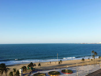 High angle view of beach against clear blue sky