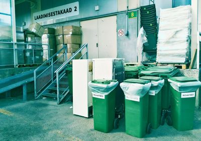 Recycling bins outside building