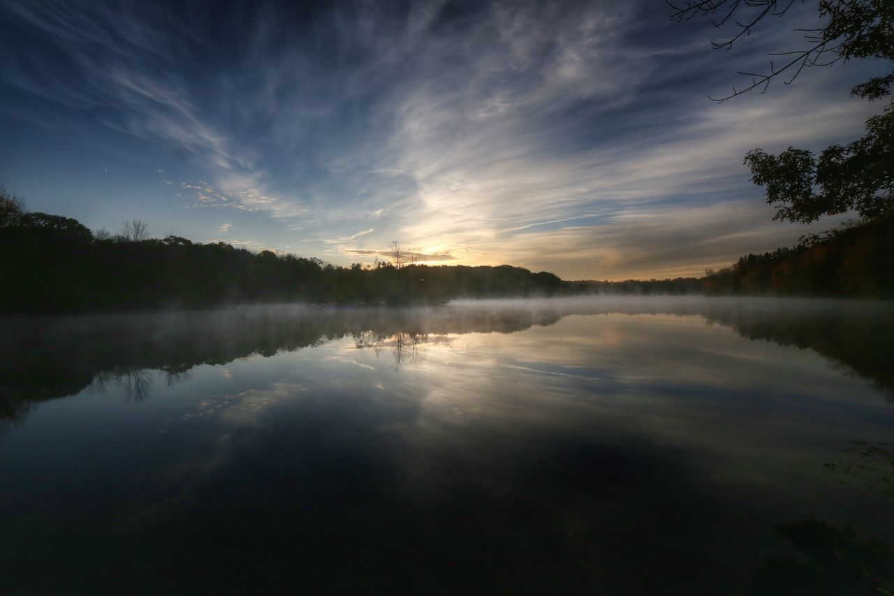 tranquil scene, water, reflection, lake, tranquility, scenics, beauty in nature, sky, tree, nature, sunset, silhouette, idyllic, waterfront, cloud - sky, non-urban scene, calm, forest, cloud, outdoors